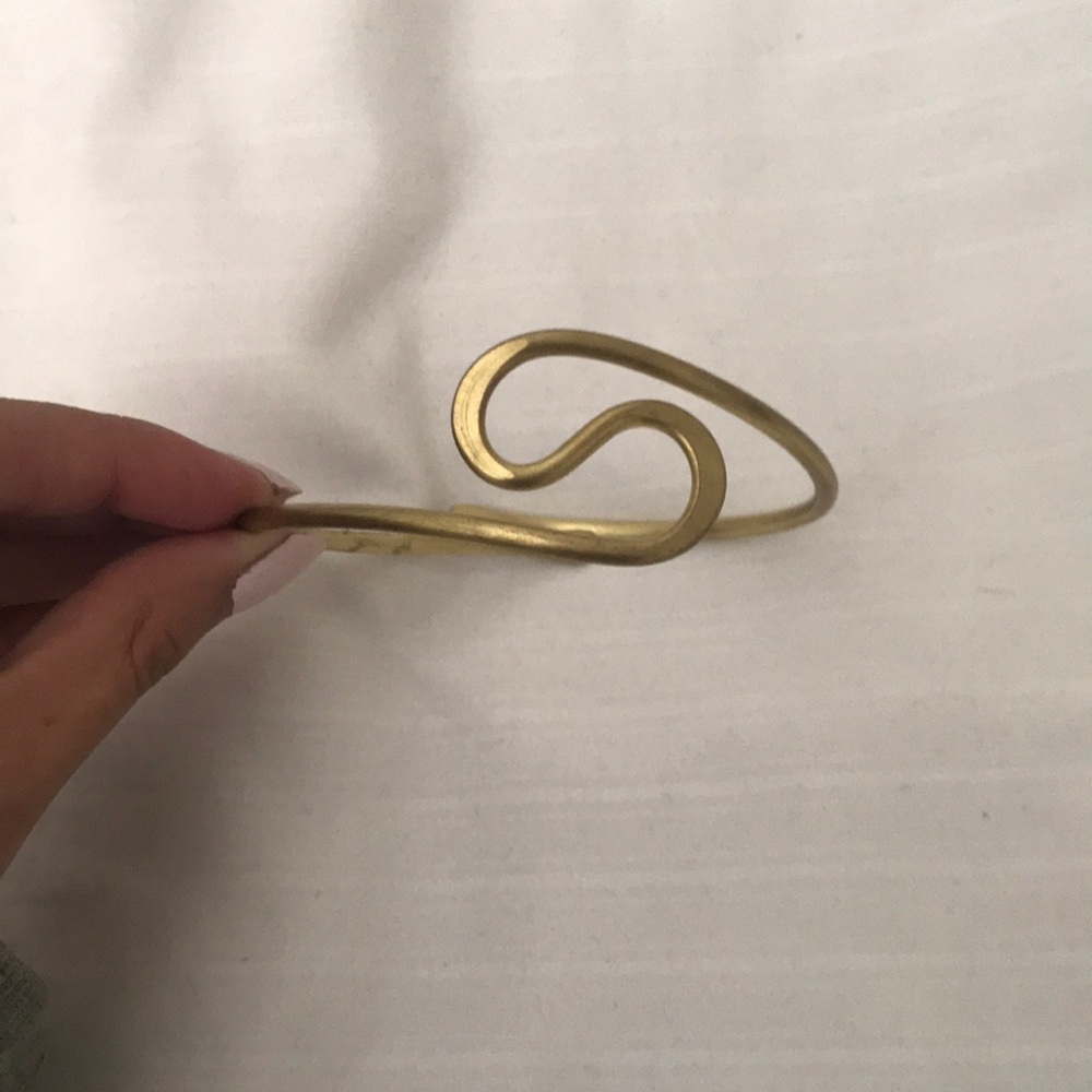 Gold free people arm band